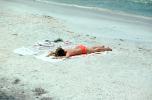Woman laying in the sun, beach, tanning, sun worshippers, RVLV10P07_02