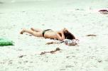 Woman laying in the sun, beach, tanning, sun worshippers, RVLV10P07_05