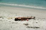 Woman laying in the sun, beach, tanning, sun worshipper, RVLV10P07_06