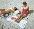 Girls Sunning on the Beach, sand