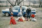 Ford Fairlane, roadside picnic, girls, men, woman, toddler, 1950s, RVPV01P10_17
