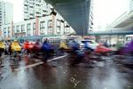 Bicyclist riding in the rain, crosswalk, SBYV03P13_19