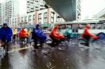 Bicyclist riding in the rain, crosswalk, SBYV03P14_01