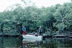 Mangroves, trees, swamps, outboard motor boat, boys, wetlands, bayou, SFIV01P15_02