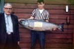 65 pound king salmon, boy, man, glasses, pipe, 1950s, fish catch