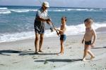 Beach, Ocean, Rod, Reel, fishermen, man, boys, fish, Outer Banks, North Carolina, 1960s