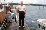 fishermen, man, fish, dock, fish catch, Florida, 1959, 1950s, SFIV02P08_11