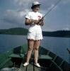 Woman, Boat, Rod and Reel, Fishing Pole, fancy pants, legs, knees, shoes, hat, fashion, 1950s, SFIV02P10_14