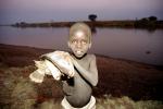 Boy with fish, Africa, fish catch, SFIV02P13_09