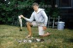 Fish Catch, smiling boy, backyard, Cape Cod, Massachusetts, 1961, 1960s