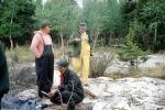 Wilderness cooking, Camp Fire, men, males, Manitoba, Canada, 1970, 1970s, SFIV03P01_12