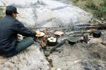 Wilderness cooking, Camp Fire, Manitoba, Canada, 1970, 1970s, SFIV03P01_17