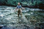 fisherman, river, water, stream, waterproof fishing pants, 1976, 1970s, SFIV03P04_01