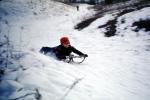 Boy Sledding Downhill in the Snow, 1950s, SKFV01P01_13