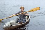 Lady Paddling a Canoe