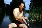 Man Rowing, male, sun exposure, sunburn, suntan, bathingsuit, sunny day, paddle, 1940s, SRKV02P06_11