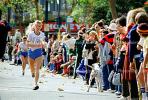 Woman runner, dalmation dog, crowds, spectators, Oakland Half Marathon finish line, SRSV04P05_14