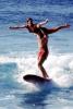 Tandem trick surfing, surfers, wave, 1960s