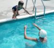 little girl jumping into a swimming pool, SWDV01P14_19B