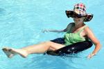 Woman Floating, Inner-tube, legs, hat, sunglasses, Swimming Pool