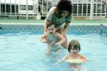 Swimming Pool, Swim Lessons, Teaching a Child to swim, Backyard Swimming Pool, 1970s, SWFV01P13_15