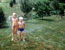 Brother, Sister, Smiles, Backyard, Summer, Sprinkler, Summertime, 1950s, SWFV02P07_18