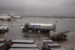 Allied Aviation fueling truck, LaGuardia Airport (LGA), Ground Equipment, belt loader, carts, rain, rainy, inclement weather, precipitation, TAAD01_286
