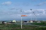 windsock, light poles, sky, (SFO)