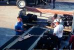 belt loader, baggage cart, ground personal, skateboard, TAAV10P09_16
