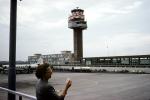 Woman, hand held device, mobile device, Rome, Control Tower, Building, Terminal, October 1961, 1960s