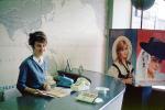 PanAm assistant, woman, telephone, reception, mod table, map, madmen, April 1962, 1960s