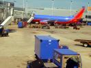 N374SW, Boeing 737-3H4, Southwest Airlines SWA, Baggage Carts, TAFD01_011