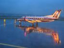 N569SW, Reflection on a Rainy evening in Portland, Embraer EMB-120ER, TAFD01_165B