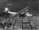 NC14716, Martin M-130, China Clipper flying over downtown San Francisco, 1930's, Pan American Airways PAA, milestone of flight
