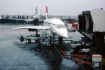 G-BOAB, British Airways BAW, jetway, rain, inclement weather, spaceship, Airbridge
