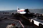 United Airlines UAL, Lockheed L-1011, jetway, pusher tug, pushback, Airbridge
