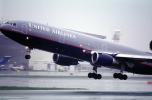 United Airlines UAL, Douglas DC-10, (SFO), rain, wet, TAFV14P03_08