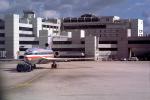 American Airlines AAL, Boeing 727, pushback, pusher tug, terminal, building