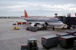 N343NW, Airbus A320 series, Northwest Airlines NWA, ground personal, carts, baggage tractor