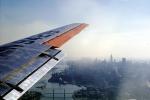 N94219, New York City, lone Wing in Flight, Manhattan, 1950s, TAFV24P13_08