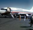N9069U, Boeing 737-222, disembarking passengers, named City of Toledo JT8D-7B , April 1974, 1970s, TAFV36P14_01