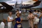N476A, Martin 404, Mother, Daughter, smiles, Passengers waiting to board flight, 1950s