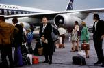 Passengers waiting to board, Overseas National Airways, ONA, TAFV47P04_09