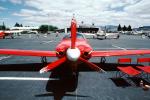 LANCAIR, red plane head-on, propeller, spinner