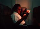 Boeing 737, Male Passenger reading, TAIV01P08_12