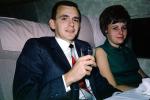 Seats, Seating, Woman, Man, drink, smiles, Passengers on a flight, September 1966, 1960s