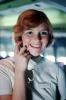 Stewardess on the intercom, Smiles, Teeth, hand, Phone, Flight Attendant, Cabin Crew, 1975, October 1975 1970s, TAIV02P05_06