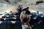 Stewardess, Boeing 707 interior, flight to SFO, men, women, July 1964, 1960s