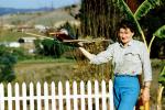Woman, Plane, White Picket Fence, 1950s, TAMV01P04_12