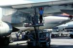 Boeing 747, fueling rig, man, manlift, hose, headphones, TAOV01P03_03